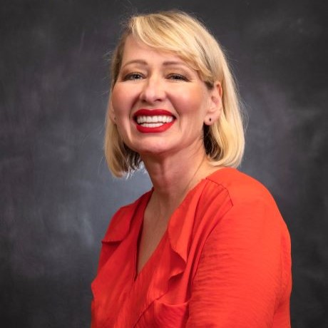 Smiling woman with blonde bob