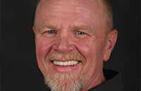 Older man with a bright smile