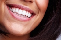Close up of woman smiling with flawless white teeth