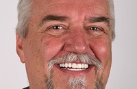Close up of gray haired man smiling