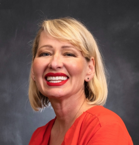 Smiling woman with blonde bob