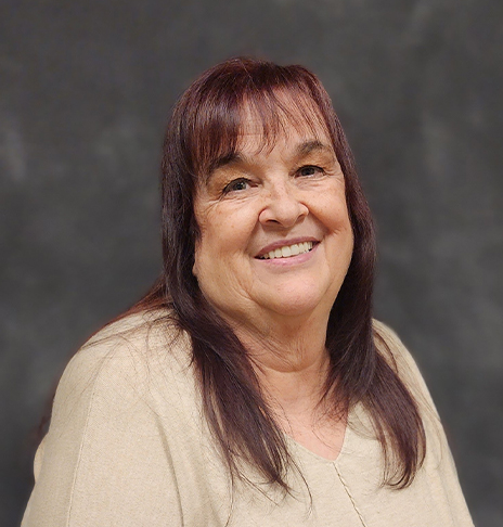 Smiling woman with long brown hair