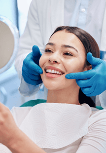 woman smiling in dental chair