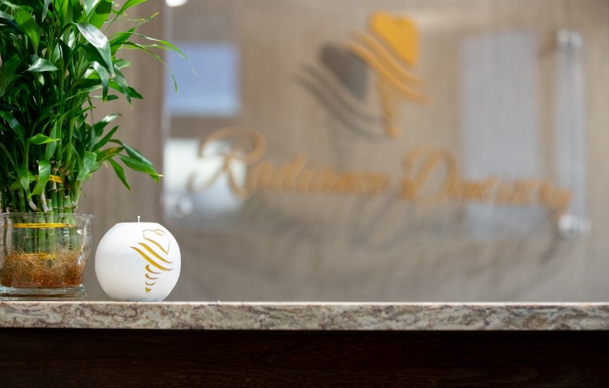 Candle and vase on front desk