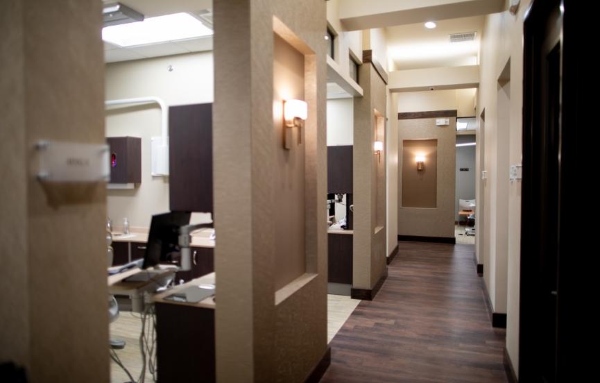 Hallway branching off into dental treatment rooms