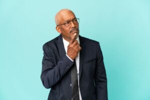 Senior man wearing contemplative expression